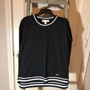 Michael Kors black top with white trim.